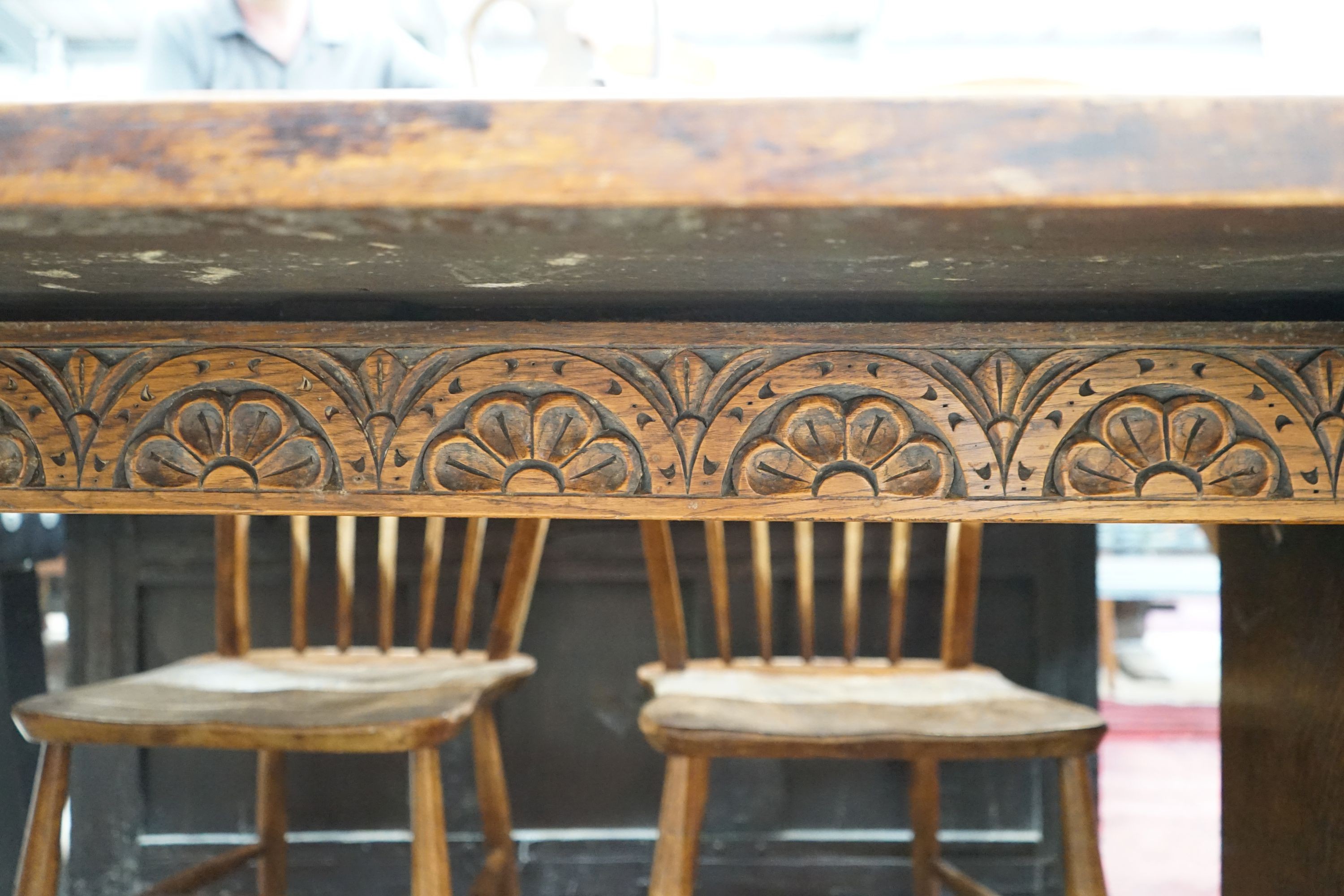 An 18th century style rectangular oak drop leaf extending dining table, depth 136cm, length 94cm extended, height 75cm